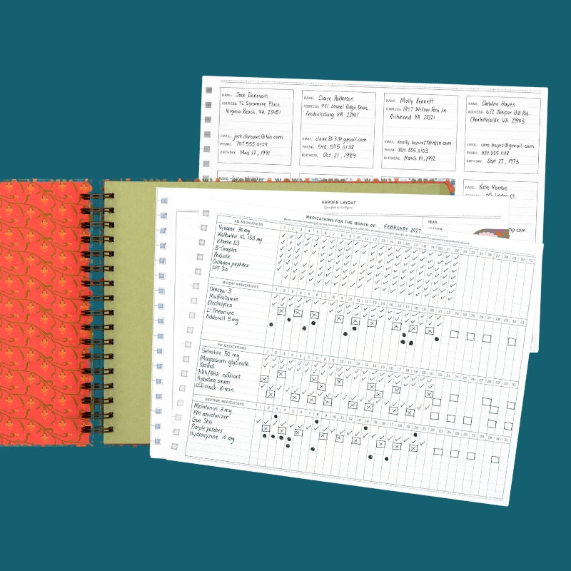 Laurel Denise Insert Keeper with a coral patterned inside cover, shown open with green dividers and a variety of planner inserts for organizing and tracking different parts of life.